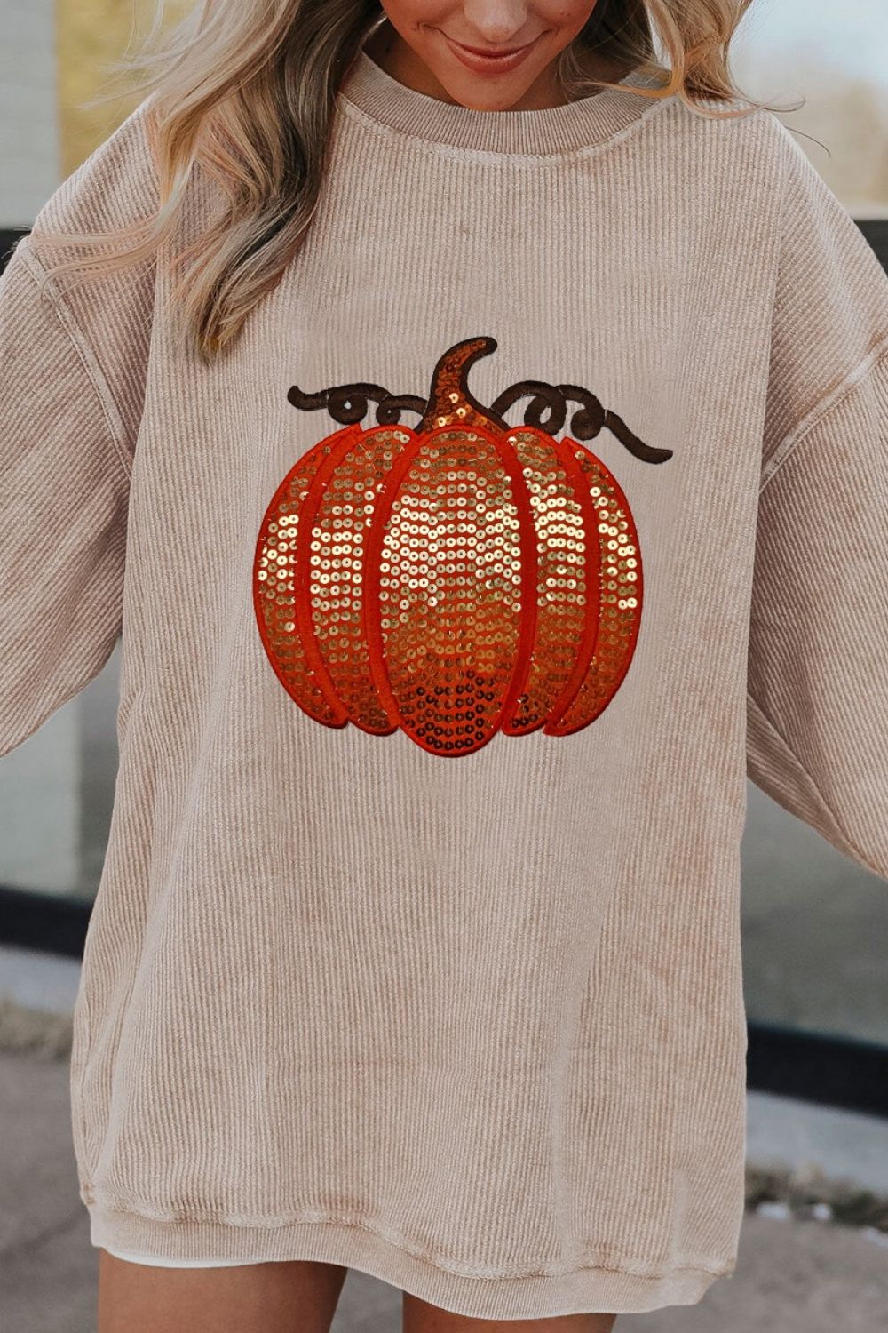 Sudadera de manga larga con cuello redondo y calabaza con lentejuelas