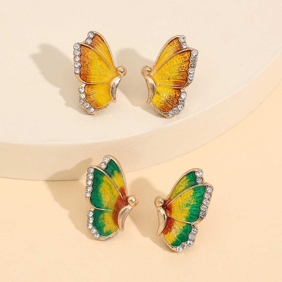 Pendientes de mariposa de aleación con diamantes de imitación de 2 piezas