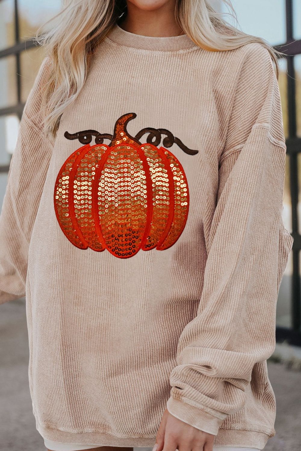 Sudadera de manga larga con cuello redondo y calabaza con lentejuelas