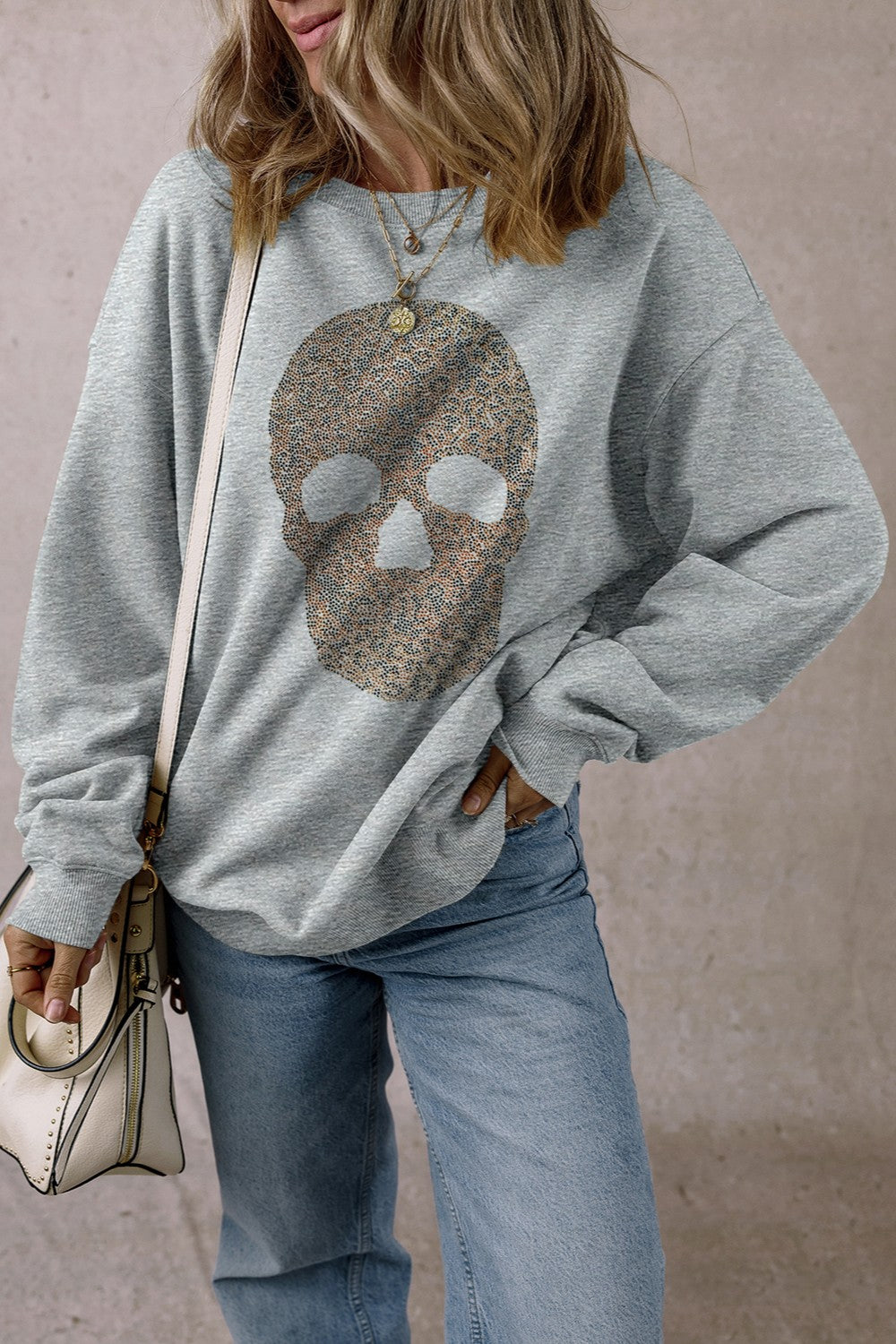 Sudadera de manga larga con cuello redondo y calavera