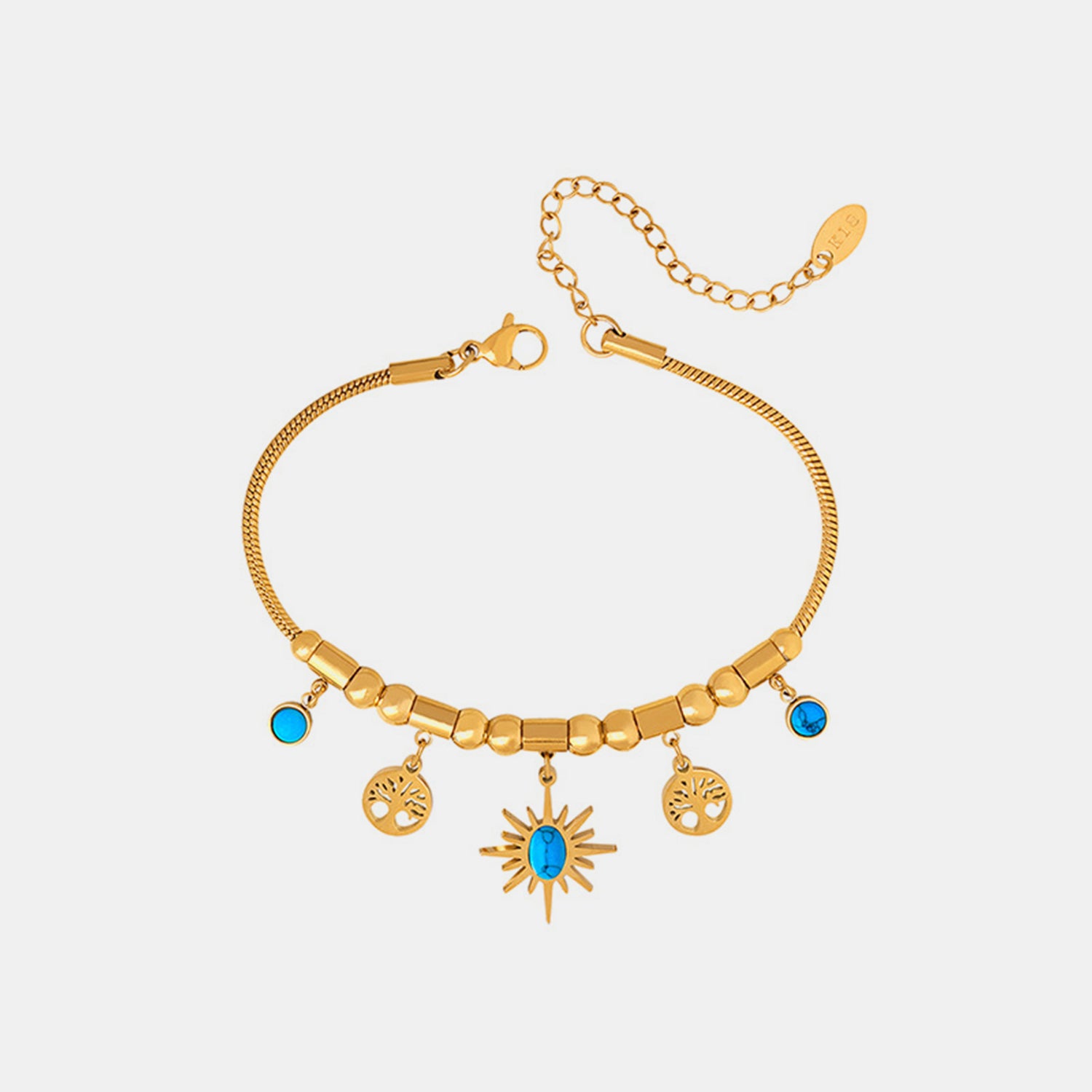 Pulsera de acero de titanio bañada en oro con dijes