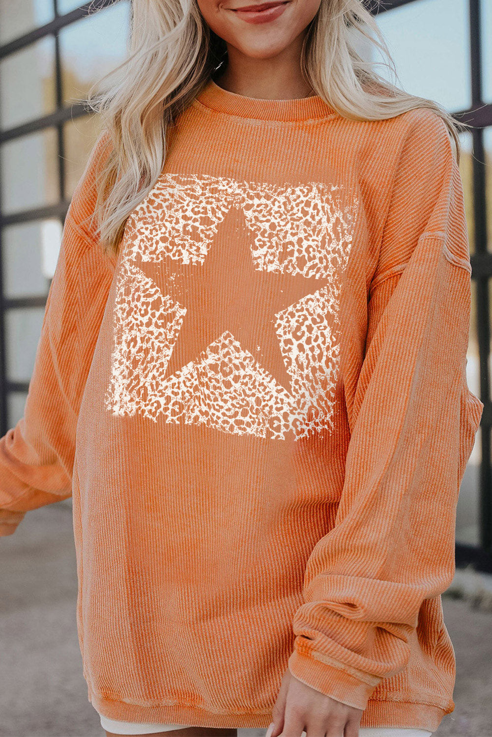 Sudadera oversize de manga larga y cuello redondo con estrellas