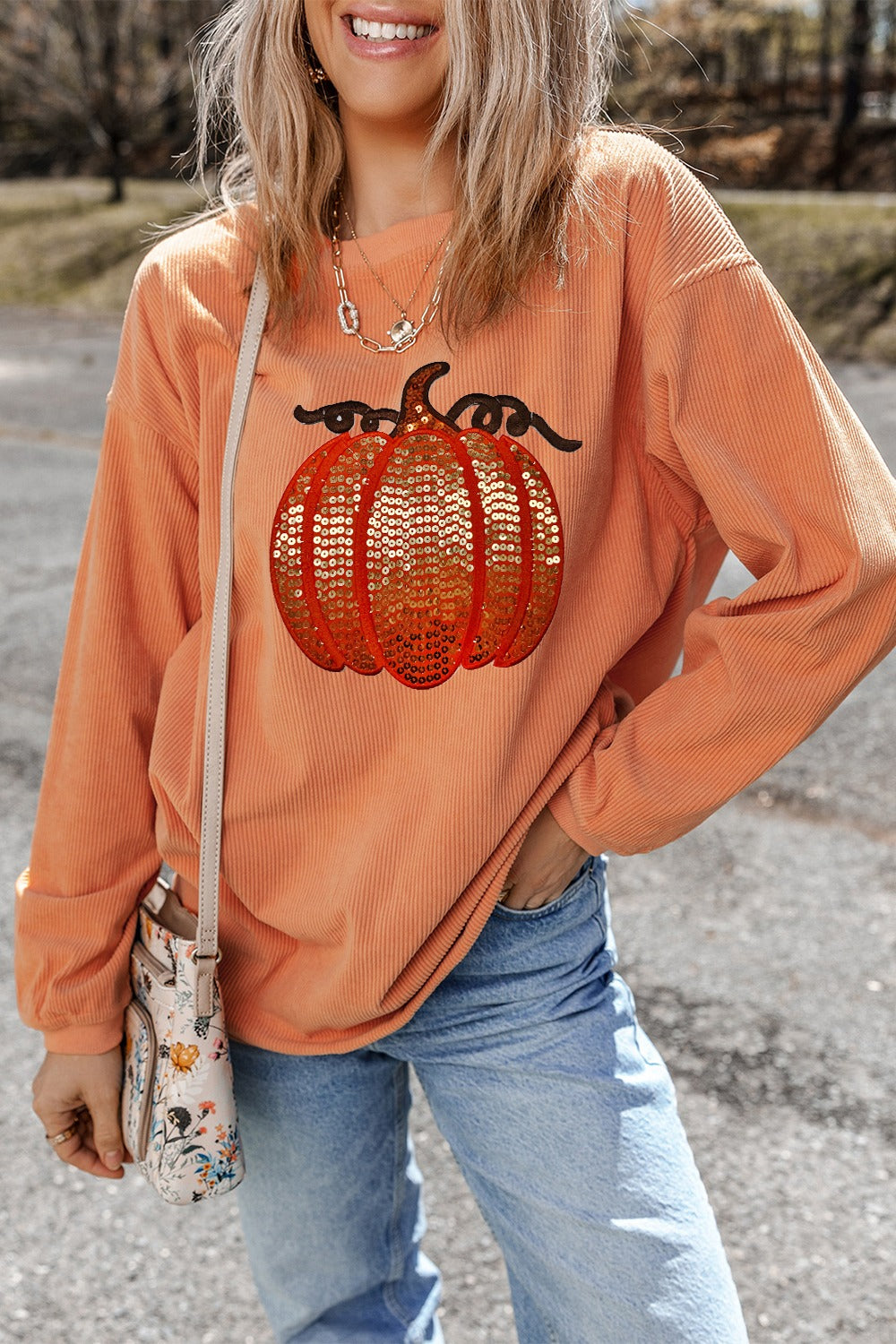 Sudadera de manga larga con cuello redondo y calabaza con lentejuelas